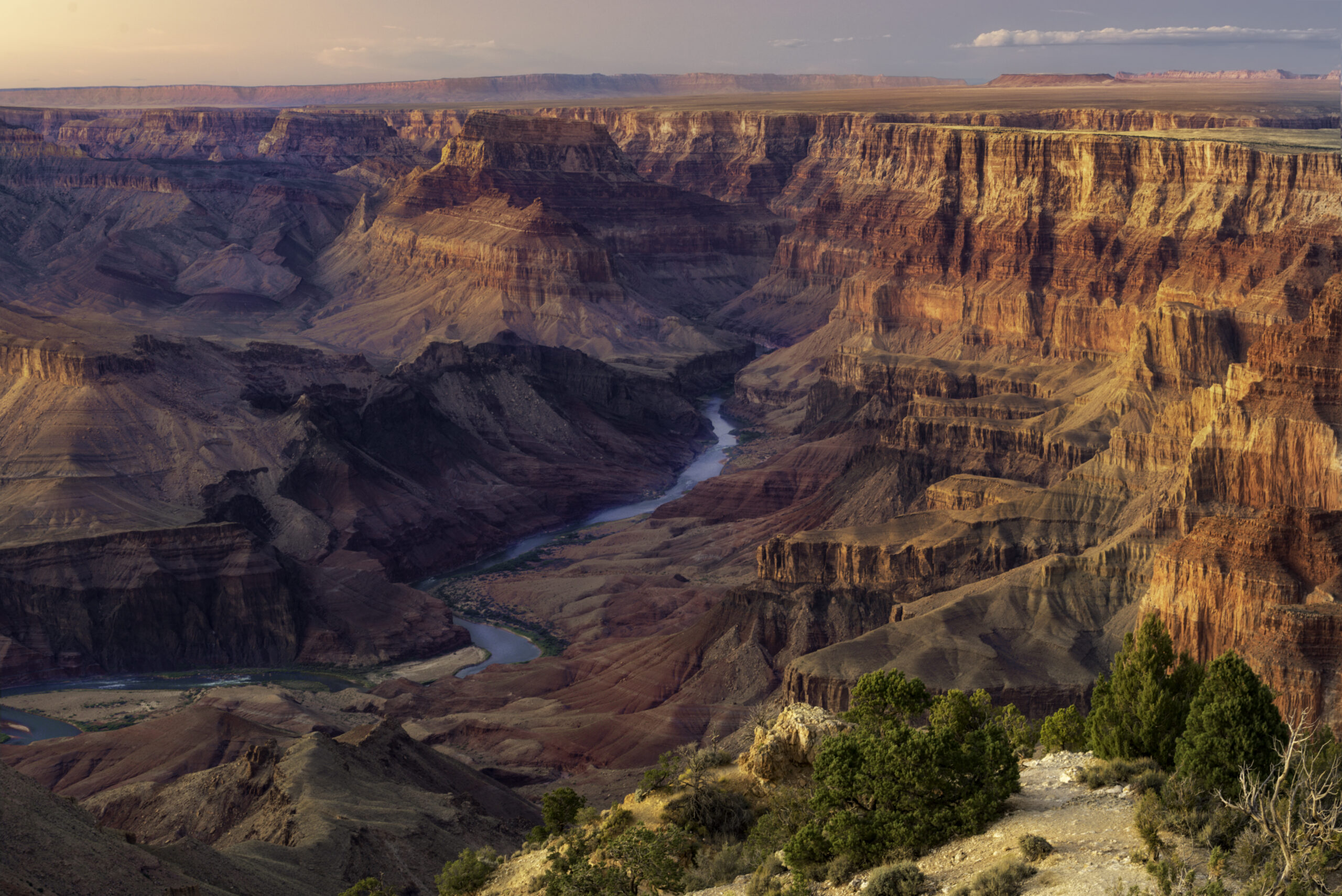 The Grand Canyon in Arizona during sunset, with an angle of the Colorado River.