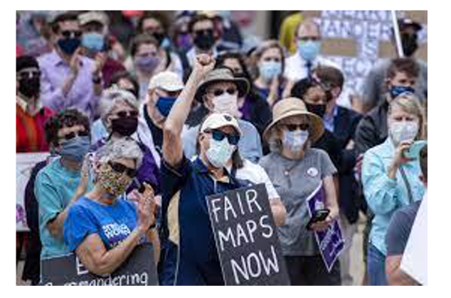 People rally in support of fair maps and to end gerrymandering.