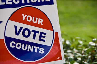 your vote counts on a lawn sign